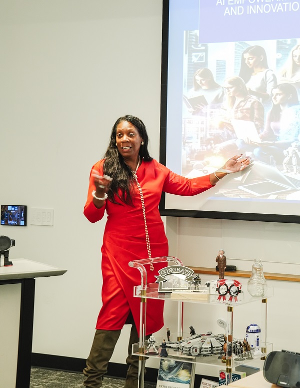 An instructor at the board teaching